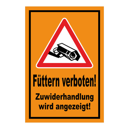 Schild Füttern verboten! Zuwiderhandlung wird angezeigt! in Orange mit schwarzer Schrift
