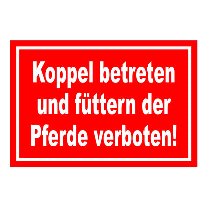 Schild Koppel betreten und Pferde füttern verboten in Rot mit weißem Rand und weißer Schrift