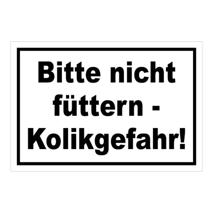 Schild Bitte nicht füttern Kolikgefahr in Weiß mit schwarzem Text und schwarzem Rand