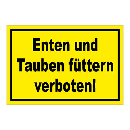 Schild Enten und Tauben füttern verboten in Gelb mit schwarzem Rand und schwarzer Schrift
