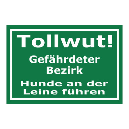 Schild Tollwut Gefährdeter Bezirk Hunde an der Leine führen in weißer Schrift auf grünem Hintergrund