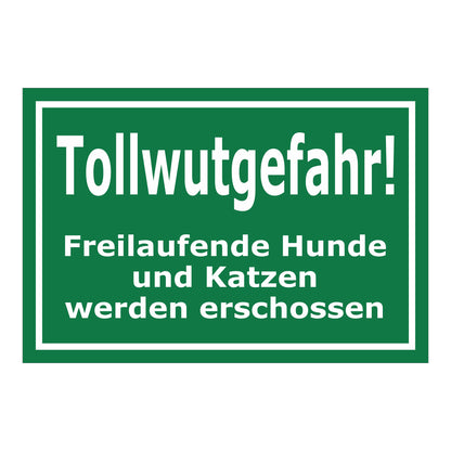 Schild Tollwutgefahr Freilaufende Hunde und Katzen werden erschossen in weiß auf grün