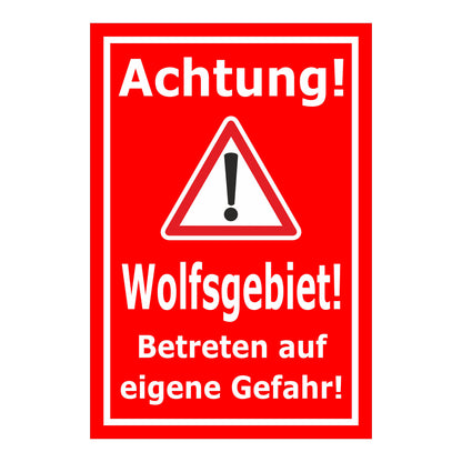 Schild Achtung Wolfsgebiet Betreten auf eigene Gefahr rot mit weißem Text und Warnsymbol