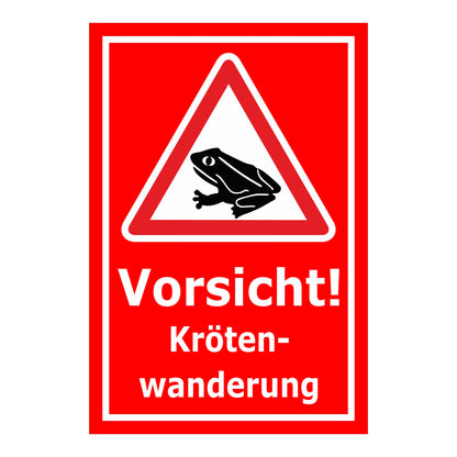 Schild Vorsicht Krötenwanderung ‚Vorsicht! Kröten-wanderung‘ roter Hintergrund mit weißer Schrift
