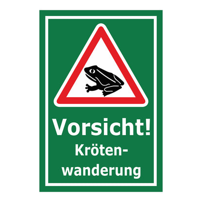 Schild Vorsicht Krötenwanderung ‚Vorsicht! Kröten-wanderung‘ grüner Hintergrund mit weißer Schrift