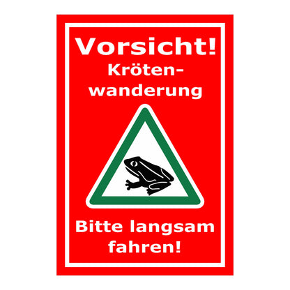 Schild Vorsicht Krötenwanderung Bitte langsam fahren in rotem Hintergrund