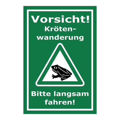 Schild Vorsicht Krötenwanderung Bitte langsam fahren in grünem Hintergrund