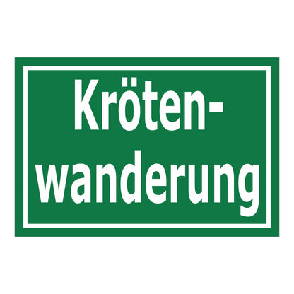 Schild Krötenwanderung ‚Kröten-wanderung‘ grüner Hintergrund mit weißer Schrift