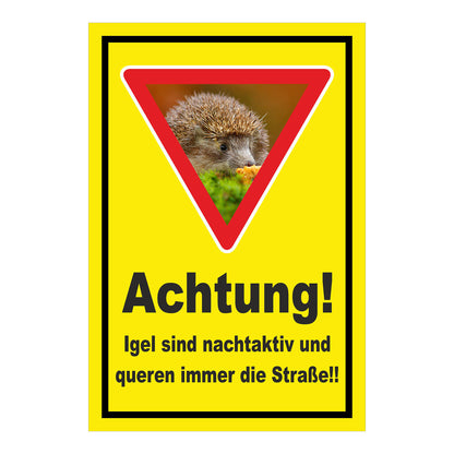 Schild Achtung Igel queren die Straße in Gelb mit schwarzem Rand