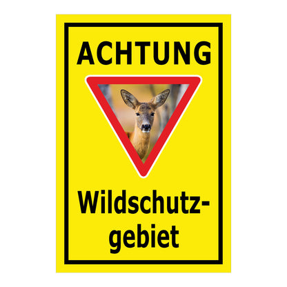 Schild Achtung Wildschutzgebiet ‚ACHTUNG Wildschutz- gebiet‘ in Gelb mit schwarzem Rahmen und Reh Motiv