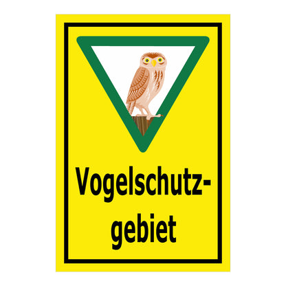 Schild Vogelschutzgebiet „Vogelschutzgebiet“ gelber Hintergrund schwarzer Rand grünes Dreieck mit Eule