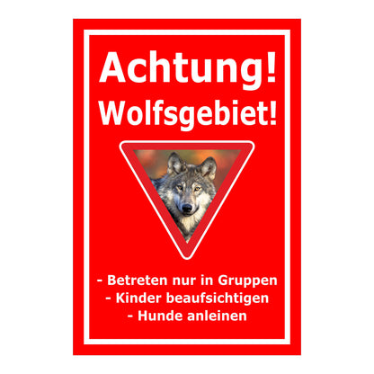 Schild Achtung Wolfsgebiet mit Verhaltenhinweisen roter Hintergrund weißer Rahmen Warnsymbol Wolf im Dreieck