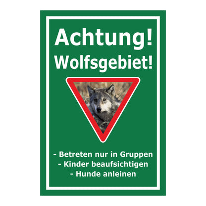 Schild Achtung Wolfsgebiet mit Verhaltenshinweisen „Achtung! Wolfsgebiet!“ in Grün mit weißem Rand